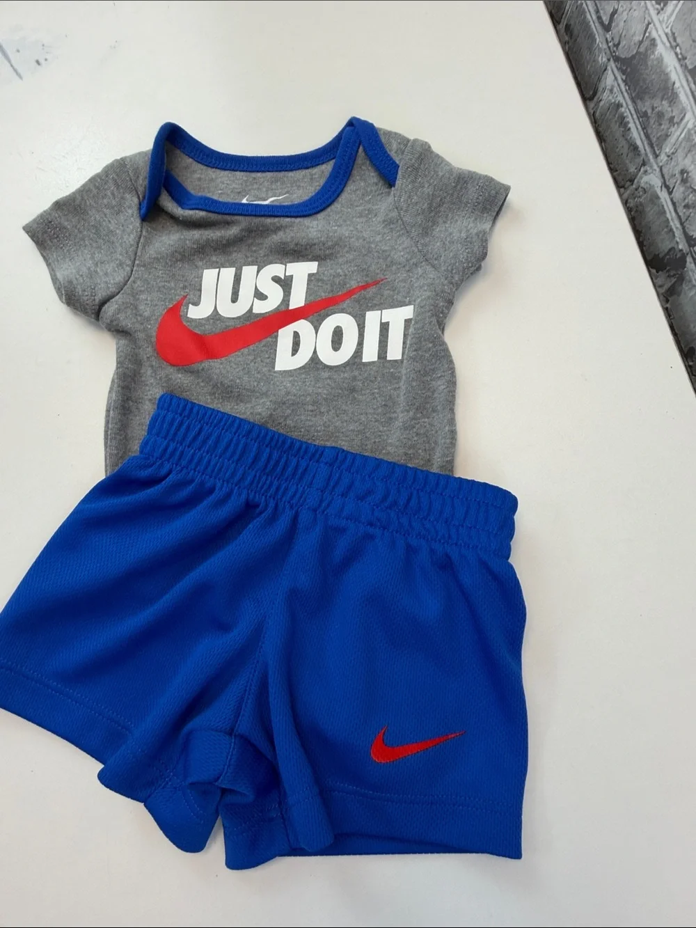 Baby boy's Nike Gray Bodysuit with Blue Shorts and Red Swoosh - Picture 6 of 6